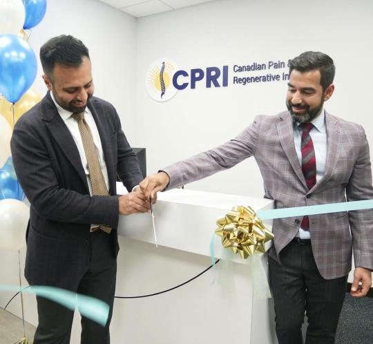 Dr Mian cuts the ribbon to officially open the CPRI clinic